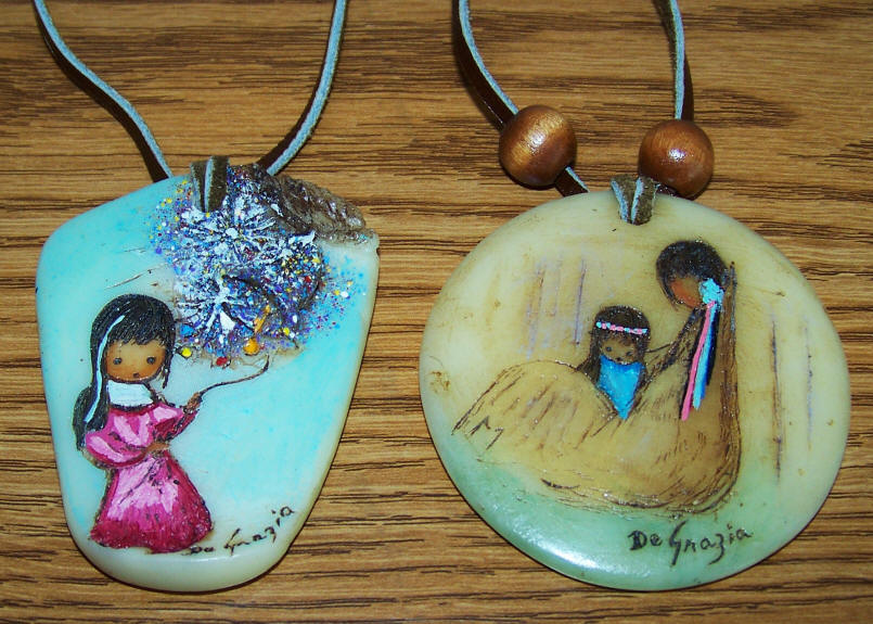 Ted DeGrazia Pendants close up