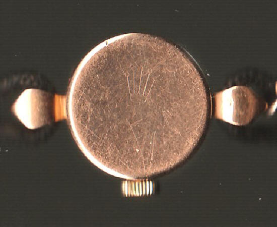 Rolex 1957 Orchid Gold Ladies Wristwatch hallmark