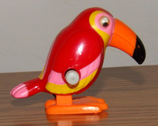Toucan TOMY Pocket Pet Wind-Up Toy side